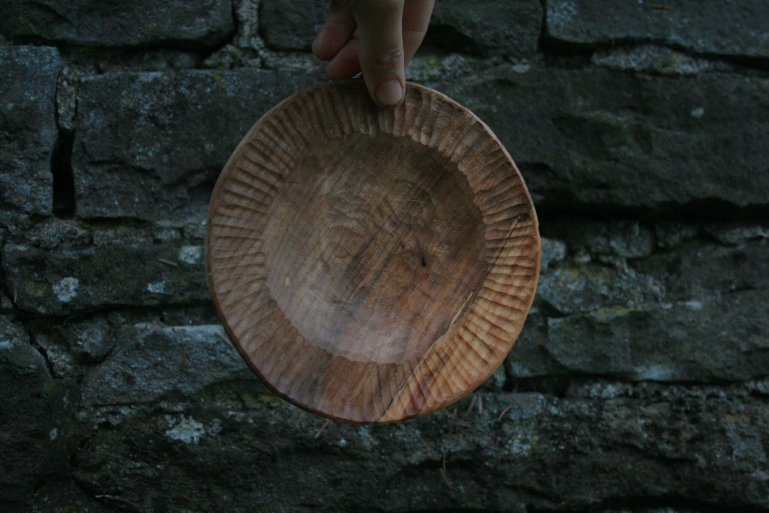 Hand carved alder plate 16cm diameter